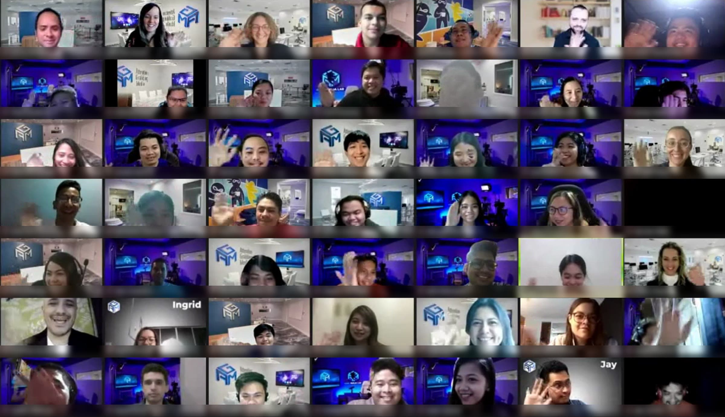A Zoom gallery of AGM remote team members waving from the Philippines, Mexico, and beyond